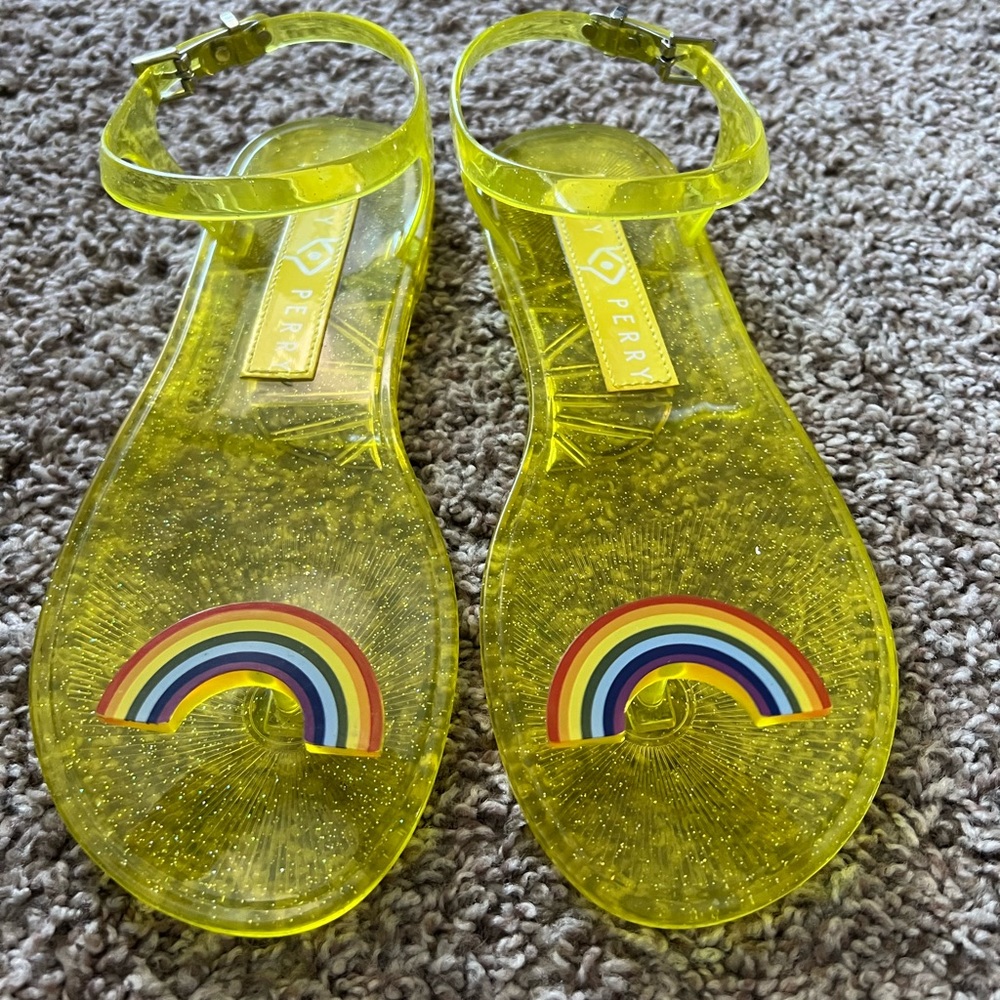 Katy Perry Jelly sandals. Yellow with rainbow toe. Buckle closure. Size 7.